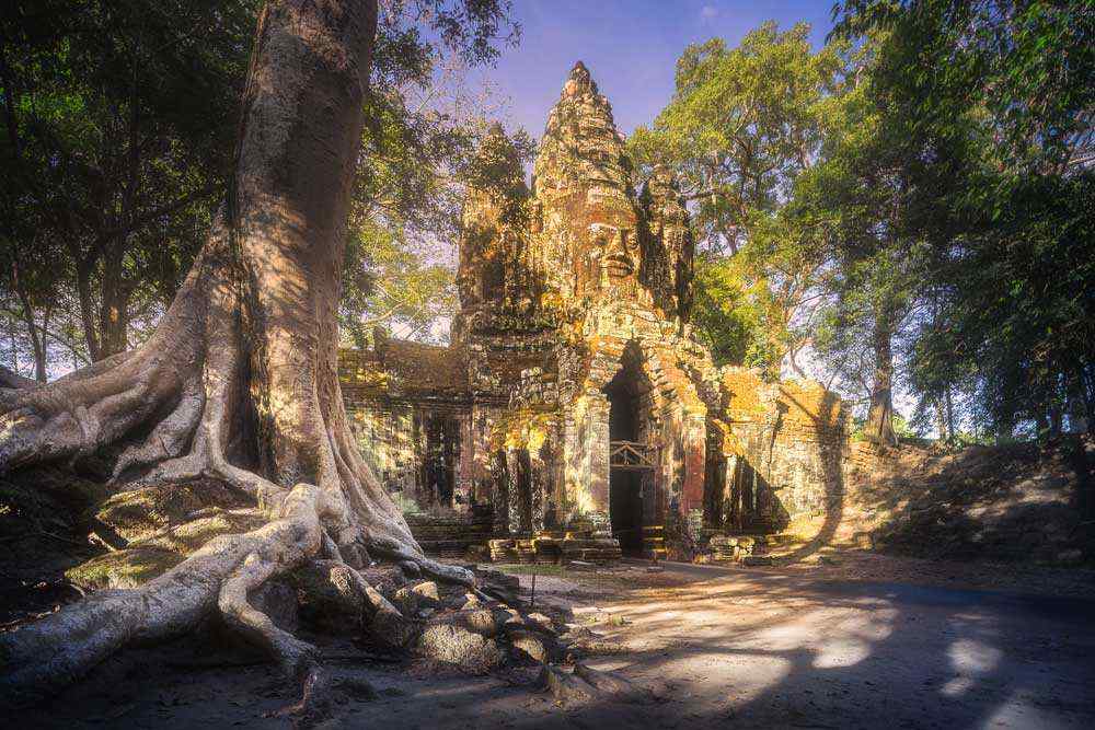 Cambodia siem reap gates of bayon temple in angkor complex with stone faces