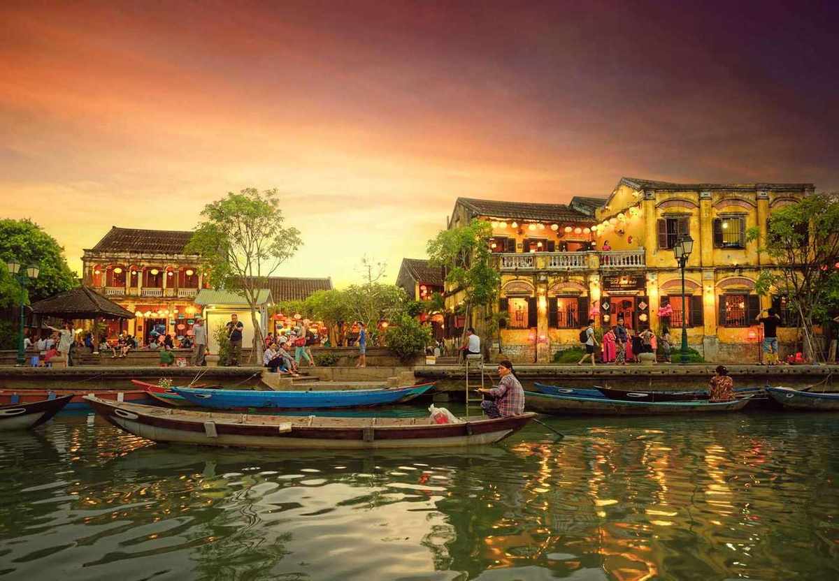 Vietnam hoi an street view with traditional boats on a background of ancient town