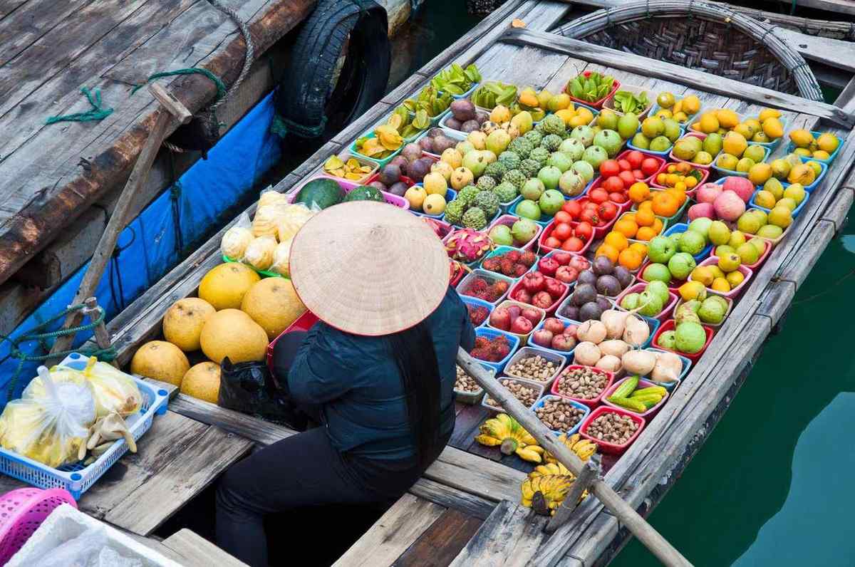 Vietnam halong greengrocer on bamboo floating boat