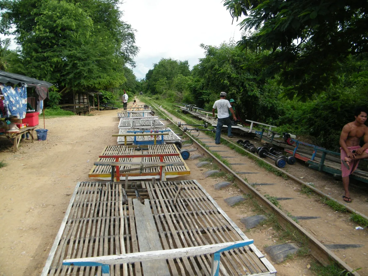 Bamboo train platforms line up along the railway tracks at a norry station near Battambang, Cambodia.